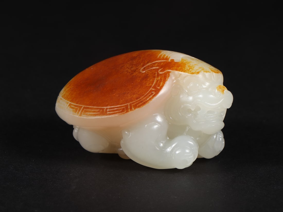 An Exquisite White Jade Auspicious Beast Ornament (1 of 9)
