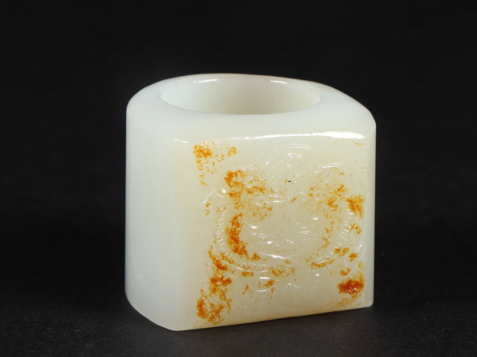 An Exquisite White Jade Dragon Pattern Ring: An Exquisite White Jade Dragon Pattern Ring Qing Dynasty, China Size:(inside diameter)2.2cm Size:2.9cm Weight:48g (The Dimensions Of All Batches Are Manually Measured.If You Need More Detailed