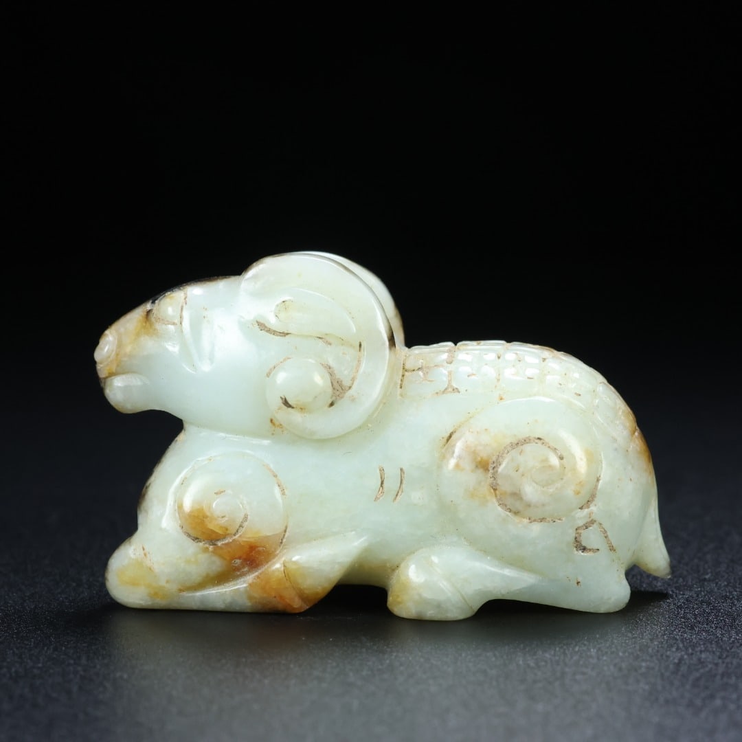 An Exquisite White Jade Sheep Ornament (1 of 9)