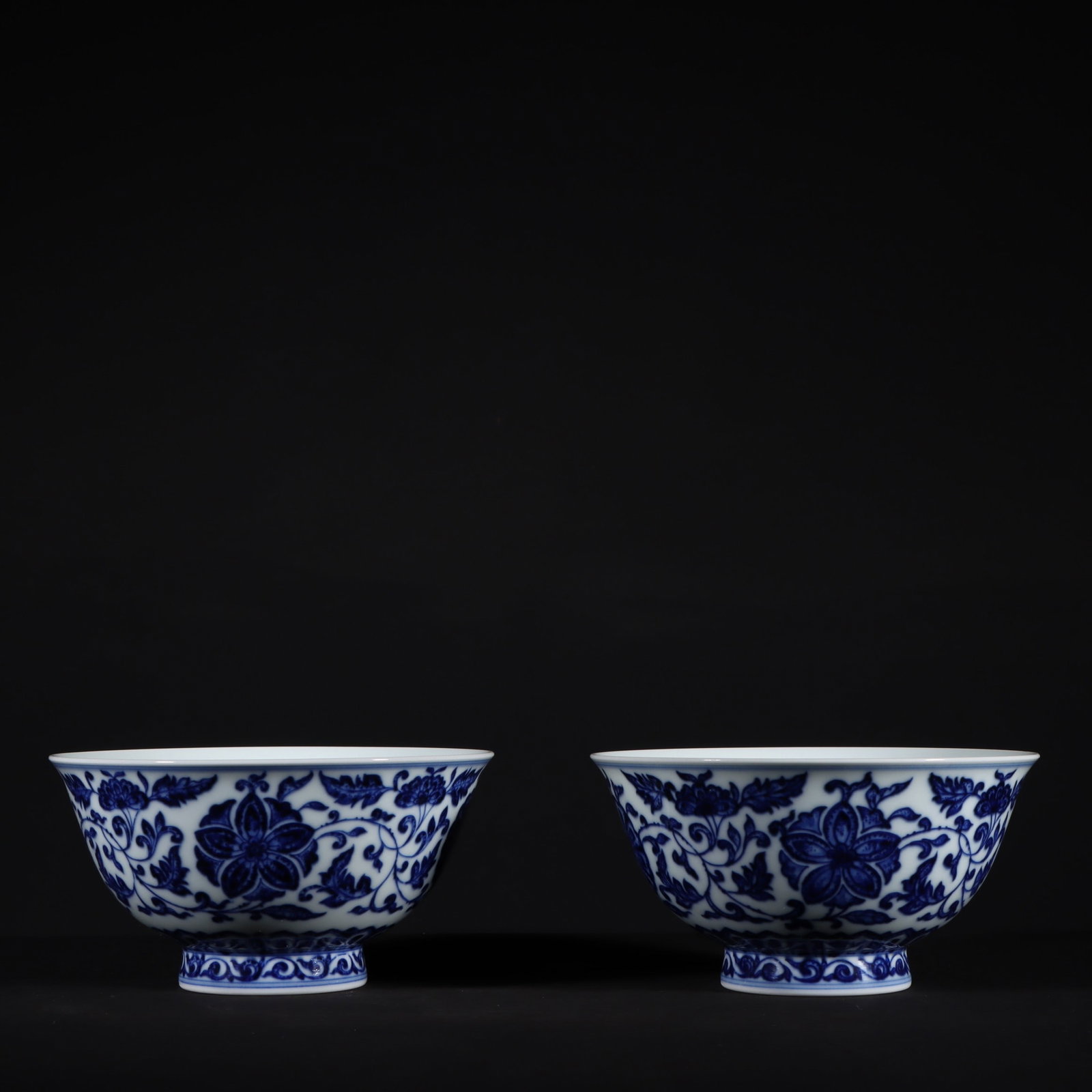 An Exquisite Blue and White Lotus Pattern Bowl: An Exquisite Blue and White Lotus Pattern Bowl Qing Dynasty, China Qianlong Six-character Mark Size:6.8cmx13cm (The Dimensions Of All Batches Are Manually Measured.If You Need More Detailed Informatio