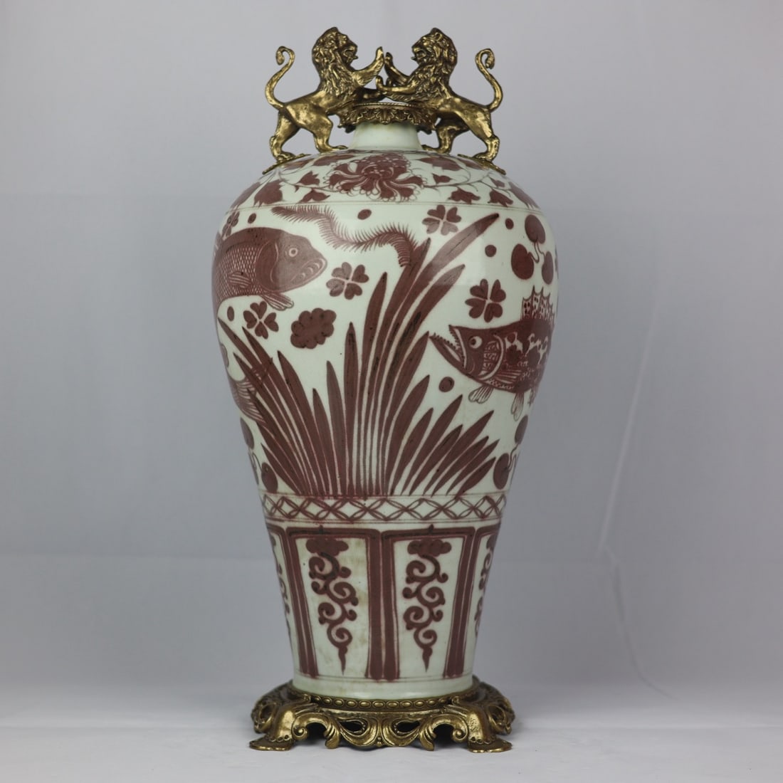 An Exquisite Blue and White Underglaze-Red Inlaid Bronze Fish and Lotus Pattern Lotus Pattern: An Exquisite Blue and White Underglaze-Red Inlaid Bronze Fish and Lotus Pattern Lotus Pattern Double-Ears Vase Yuan Dynasty, China Size:54cmx23cm (The Dimensions Of All Batches Are Manually Measured.I