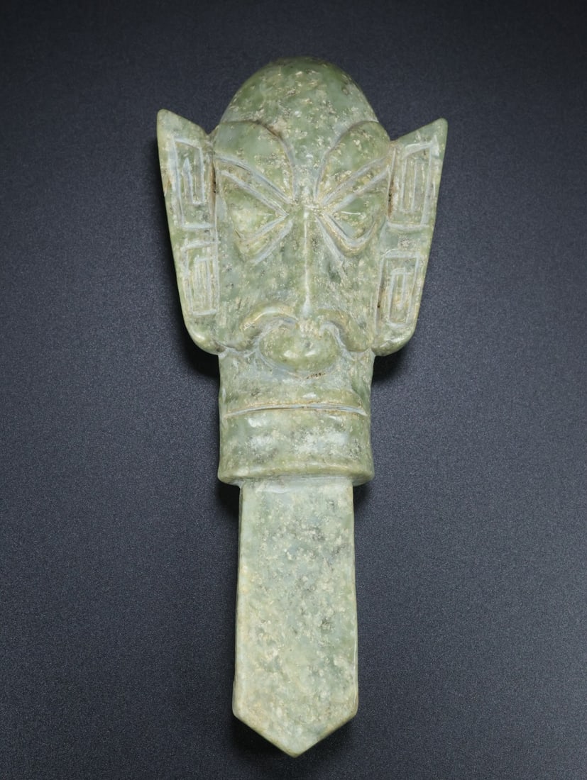 An Exquisite White Jade Mask Ornament (1 of 9)