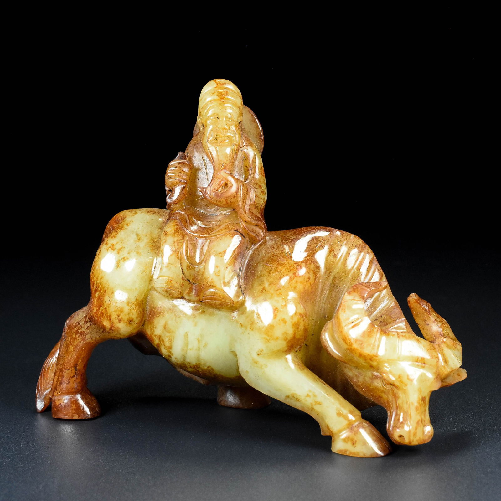 An Exquisite White Jade Buffalo Ornament (1 of 9)