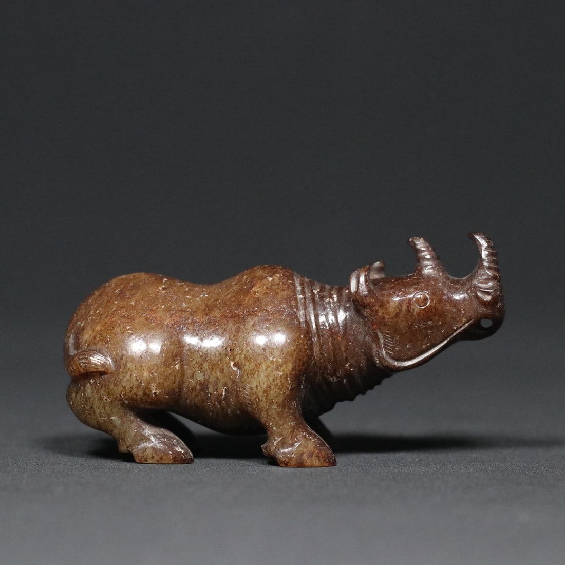 An Exquisite White Jade Rhinoceros Ornament (1 of 9)