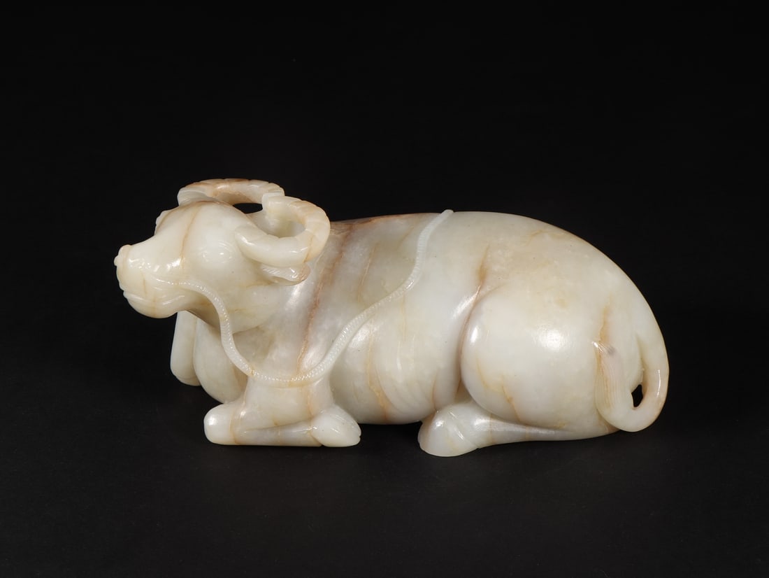 An Exquisite White Jade Buffalo Ornament (1 of 9)