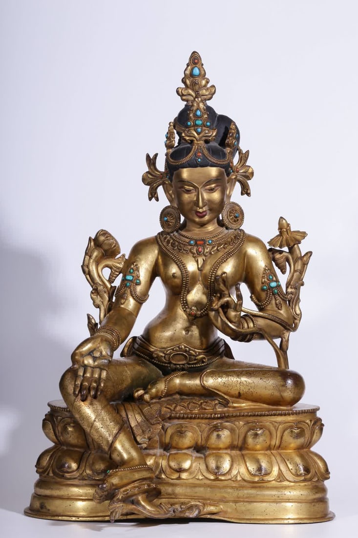 A seated statue of Tara, a bronze gilt green Tara, from the Qing Dynasty (1 of 13)