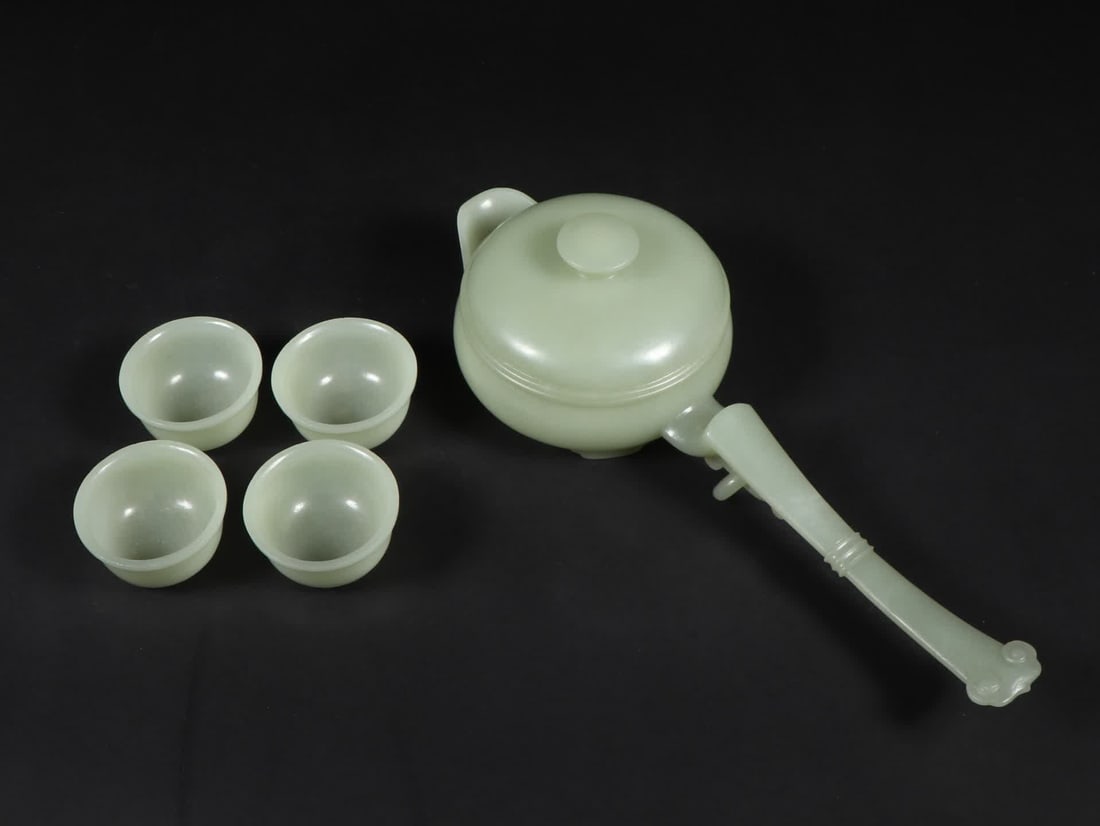 A set of Qing Dynasty Hetian jade teapots (1 of 9)