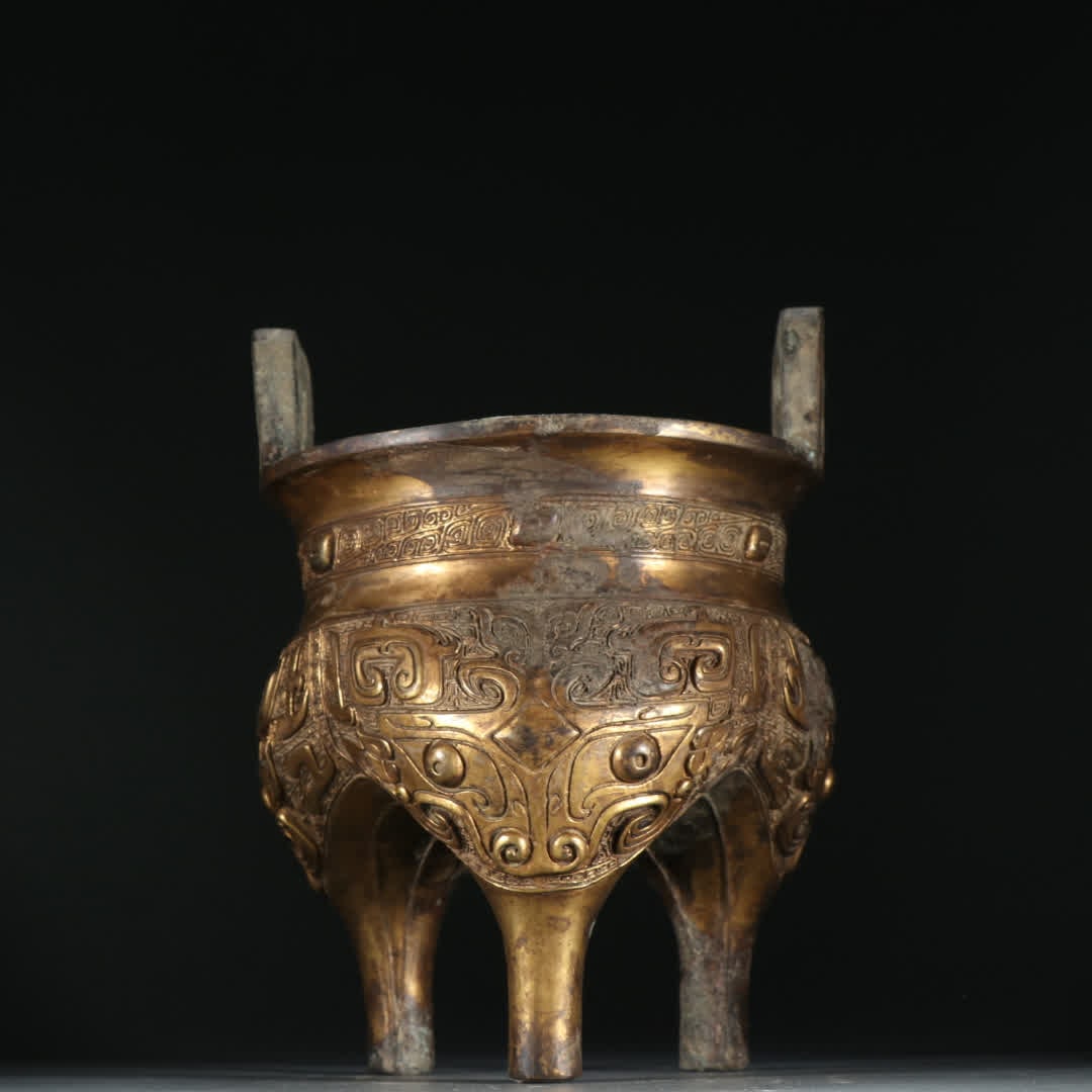 A piece of Shang Zhou copper gilt gluttonous pattern three-legged incense burner (1 of 9)