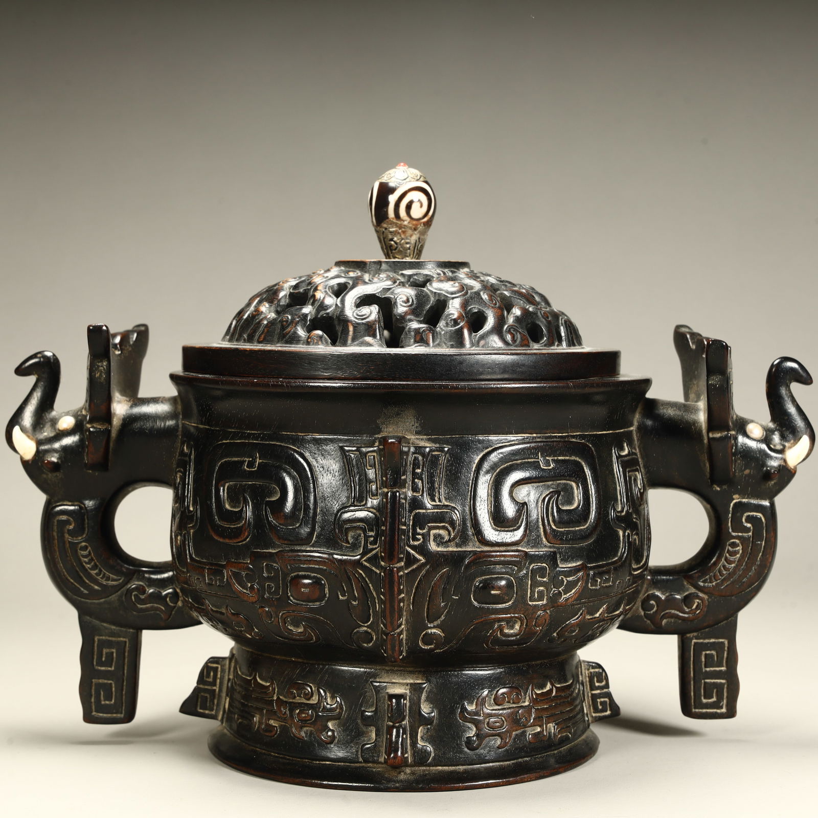 A Qing Dynasty rosewood inlaid treasure imitation bronze animal face pattern elephant ear aroma (1 of 13)