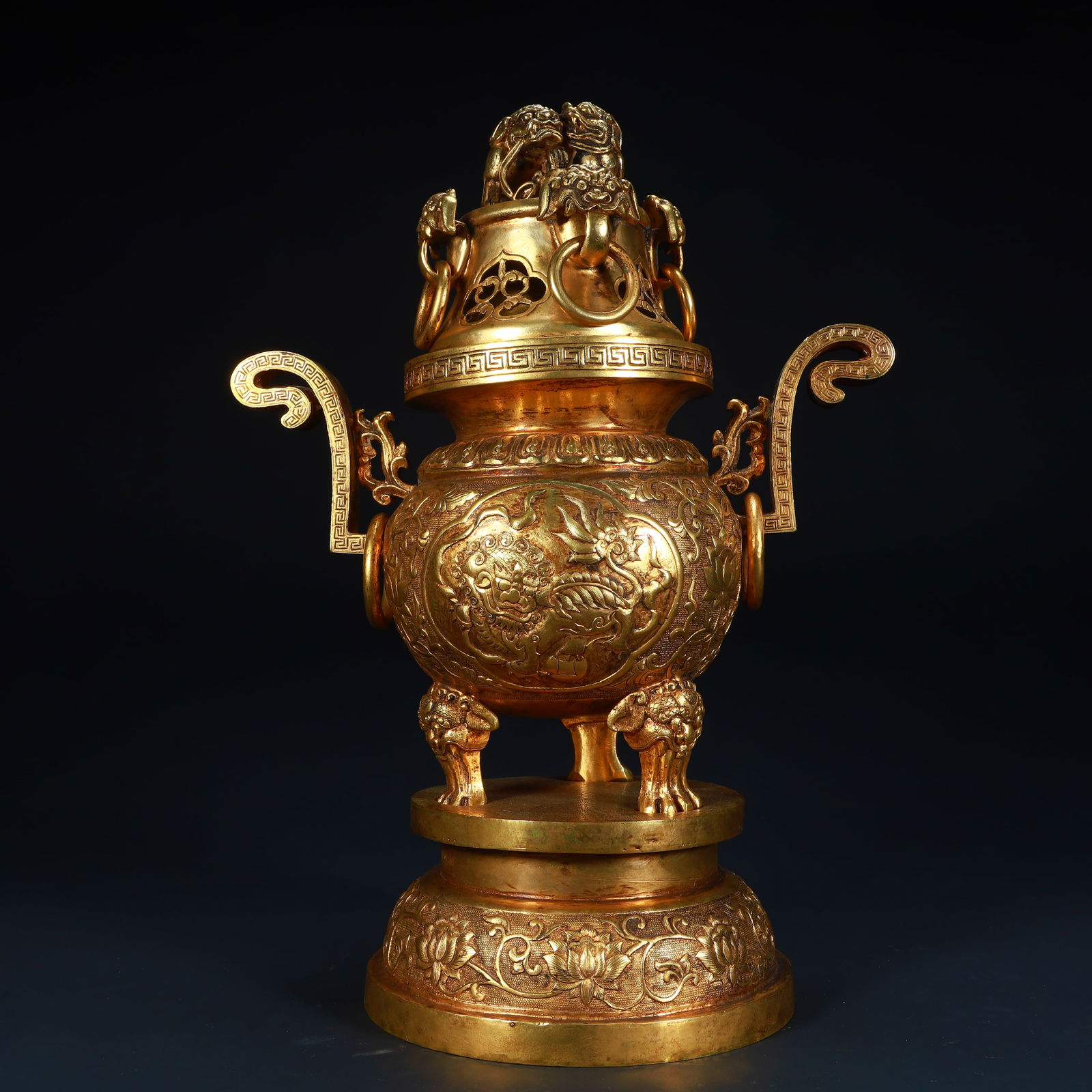 A Qing Dynasty copper-gilt lion-pattern amphora three-legged smoker (1 of 12)