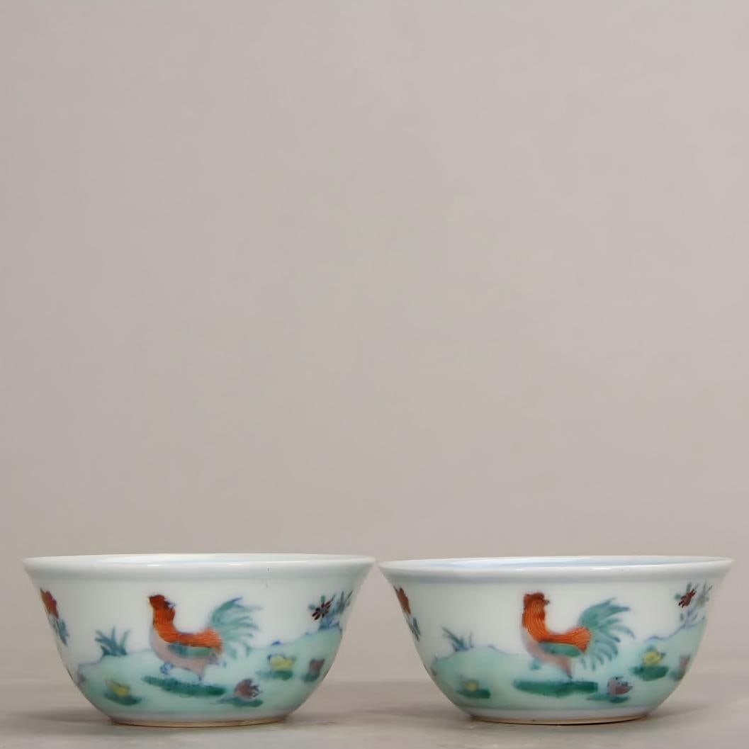 A pair of Qing Dynasty Kangxi Doucai chicken tank cups (1 of 11)