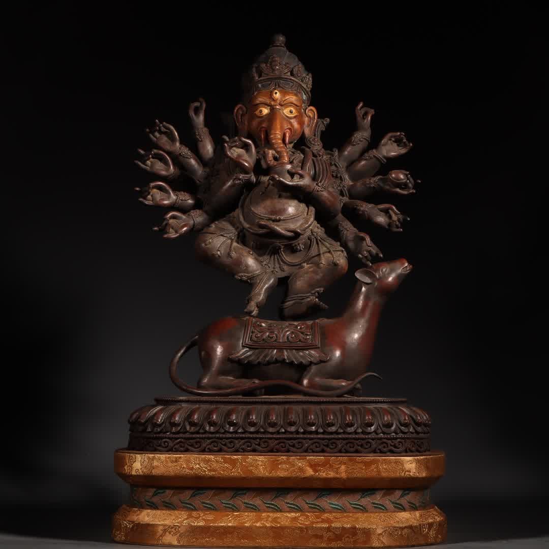 A Tibetan statue of the God of Wealth with gold elephant trunk in copper clay (1 of 14)