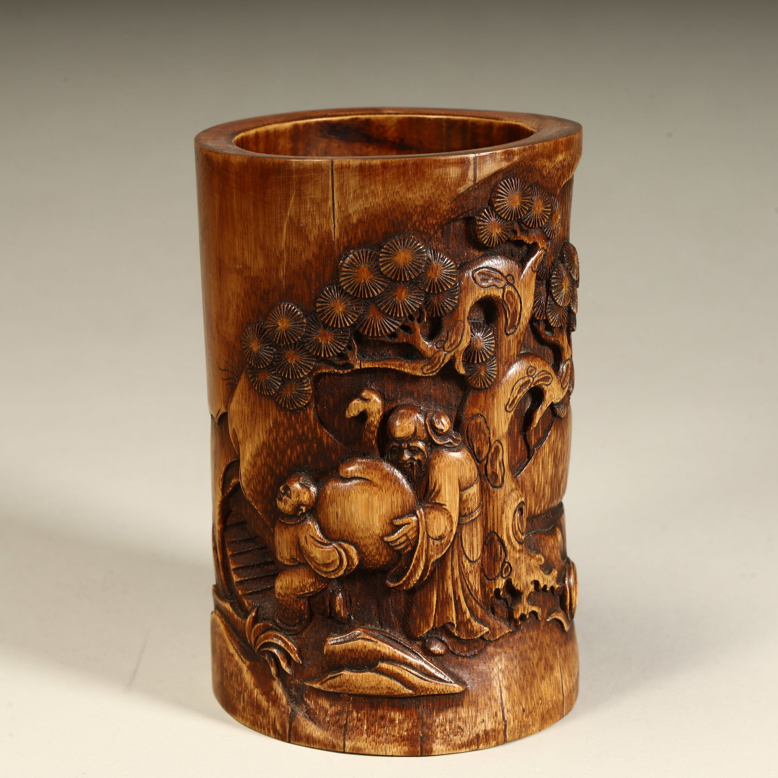 A Qing Dynasty bamboo carved figure pattern pen holder (1 of 10)