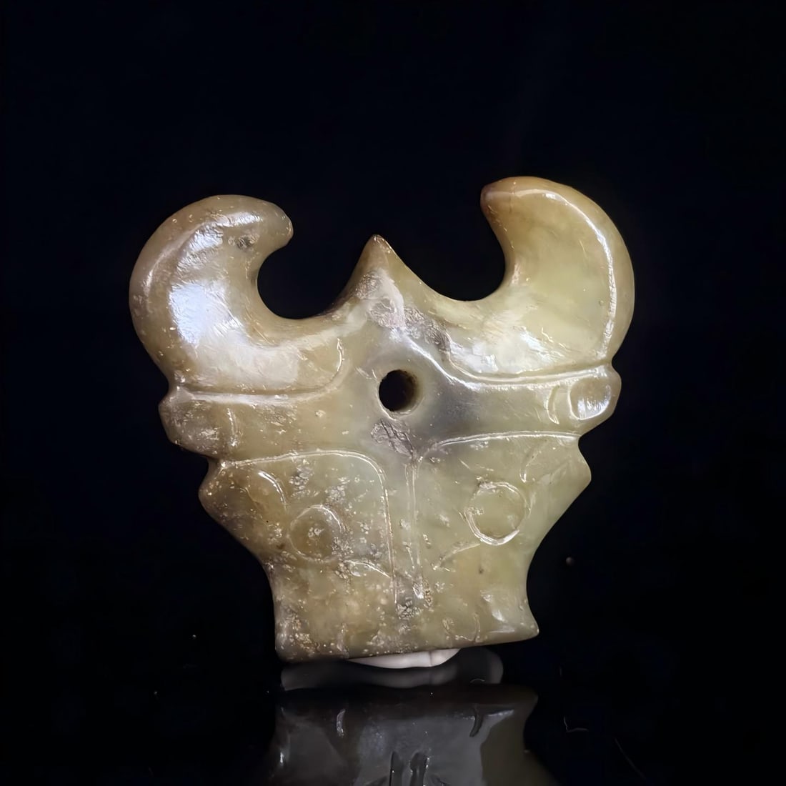 A Han Dynasty jade sheep's head beast face (1 of 9)
