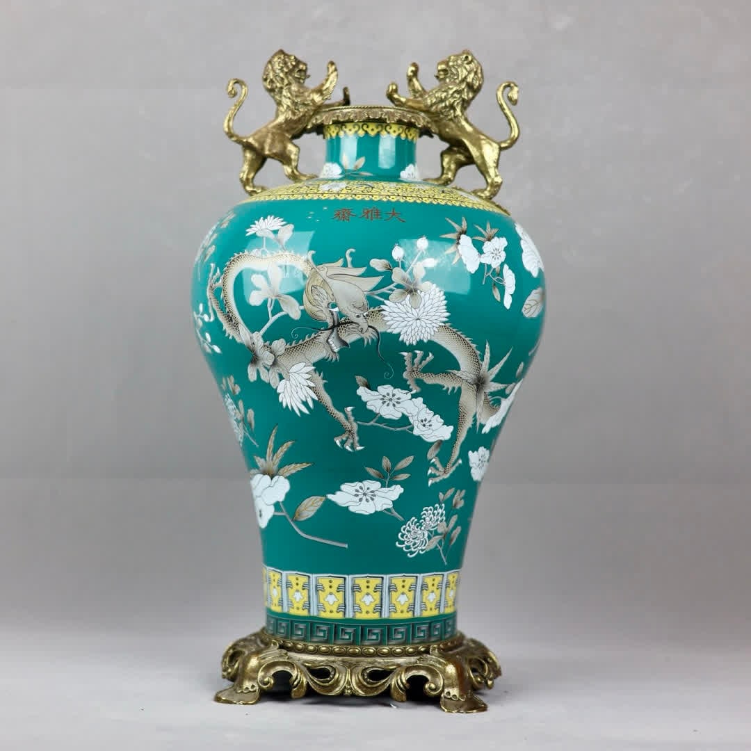 A copper-inlaid porcelain "turquoise green glaze gilded dragon pattern" plum vase (1 of 9)