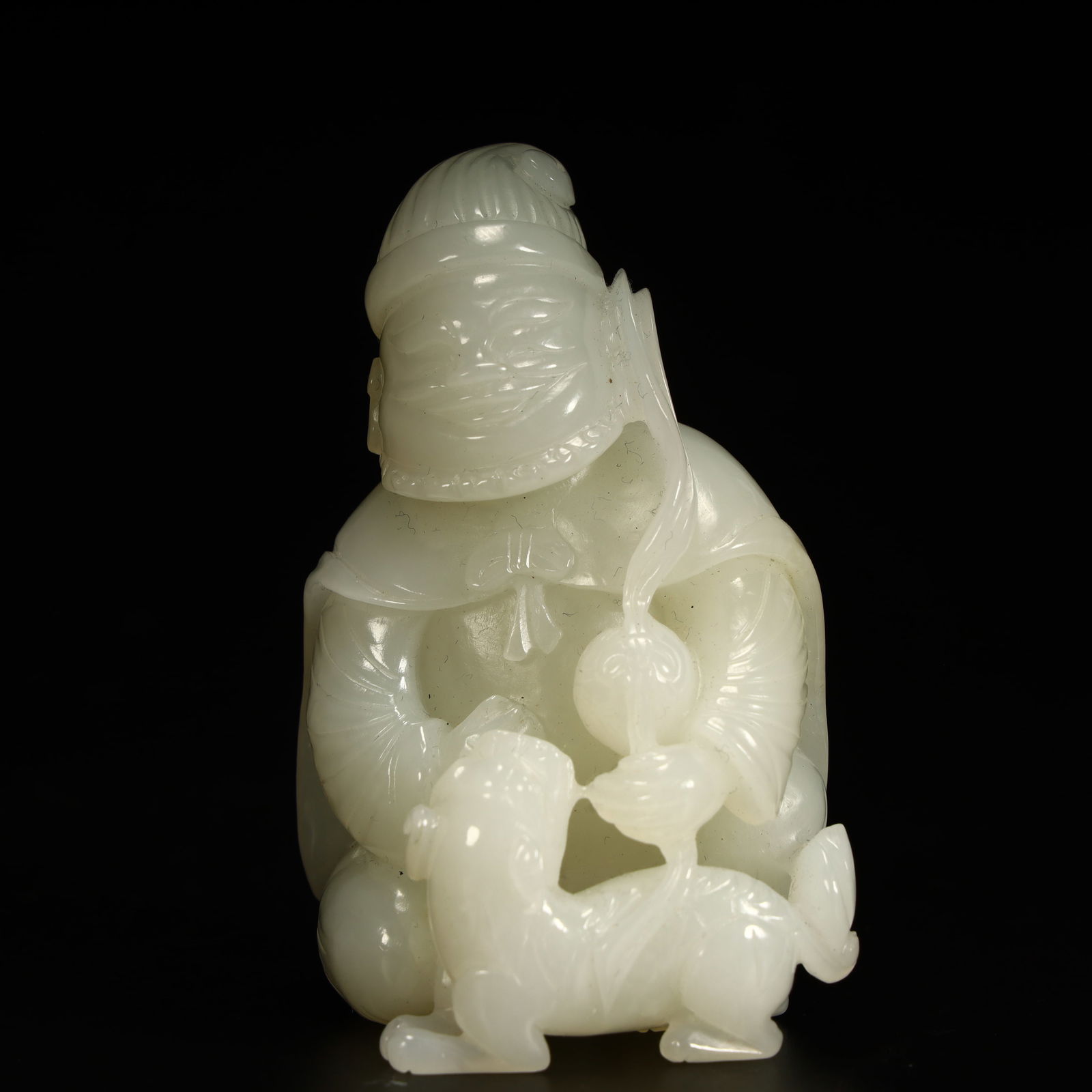 A Qing Dynasty Hetian jade lake man taming ornament (1 of 8)