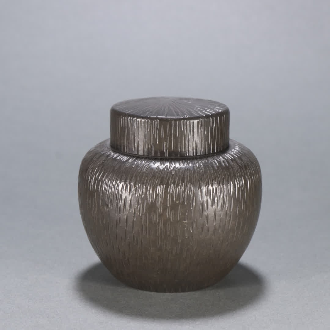A tin-carved tea jar made by Zang Maoju in the Qing Dynasty (1 of 9)
