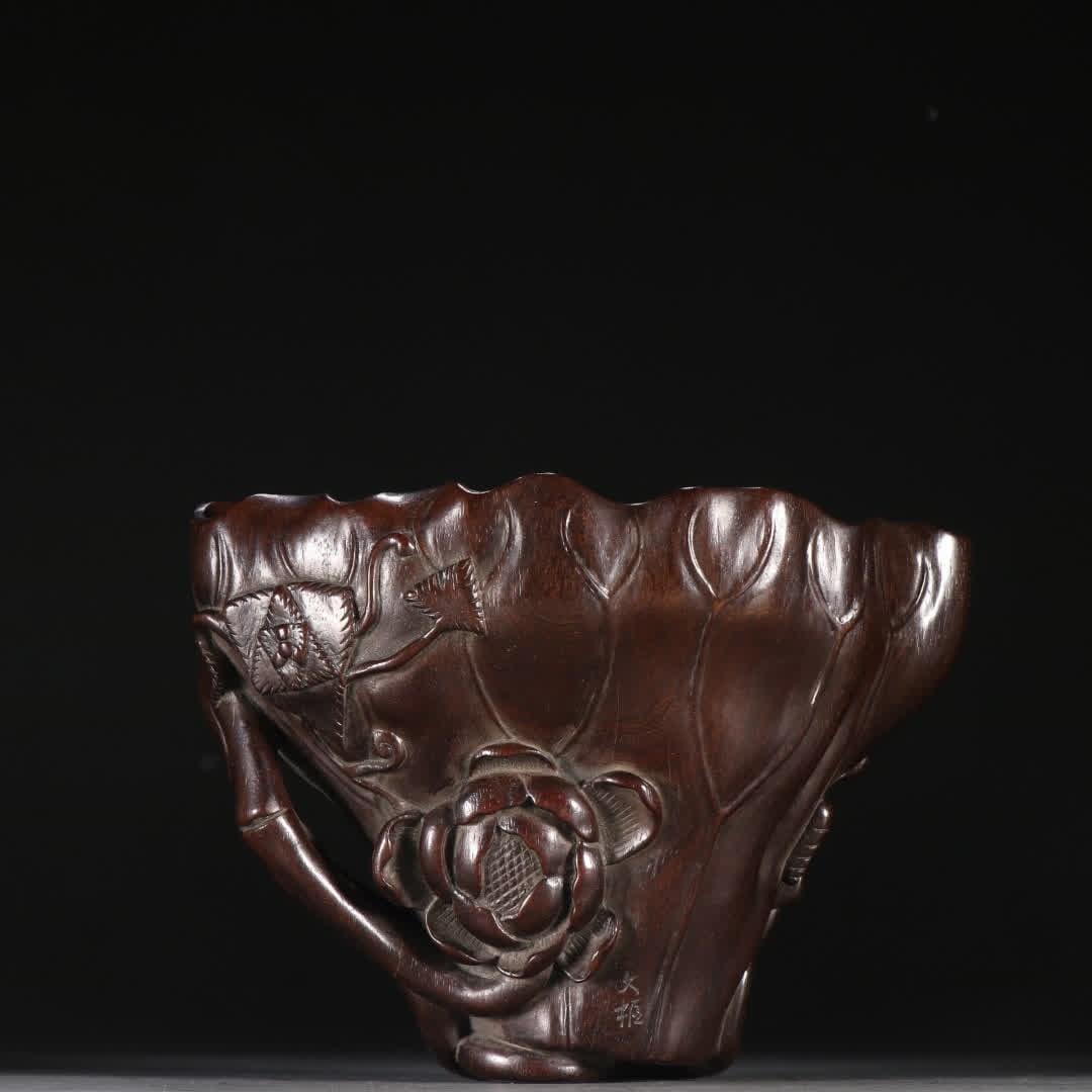 A Qing Dynasty rosewood lotus leaf cup: Qing Dynasty rosewood lotus leaf cup SIZE: H:10.6cm W:15.5cm W:390g (The Dimensions Of All Batches Are Manually Measured.If You Need More Detailed Information, Please Contact Our Customer Service Befo