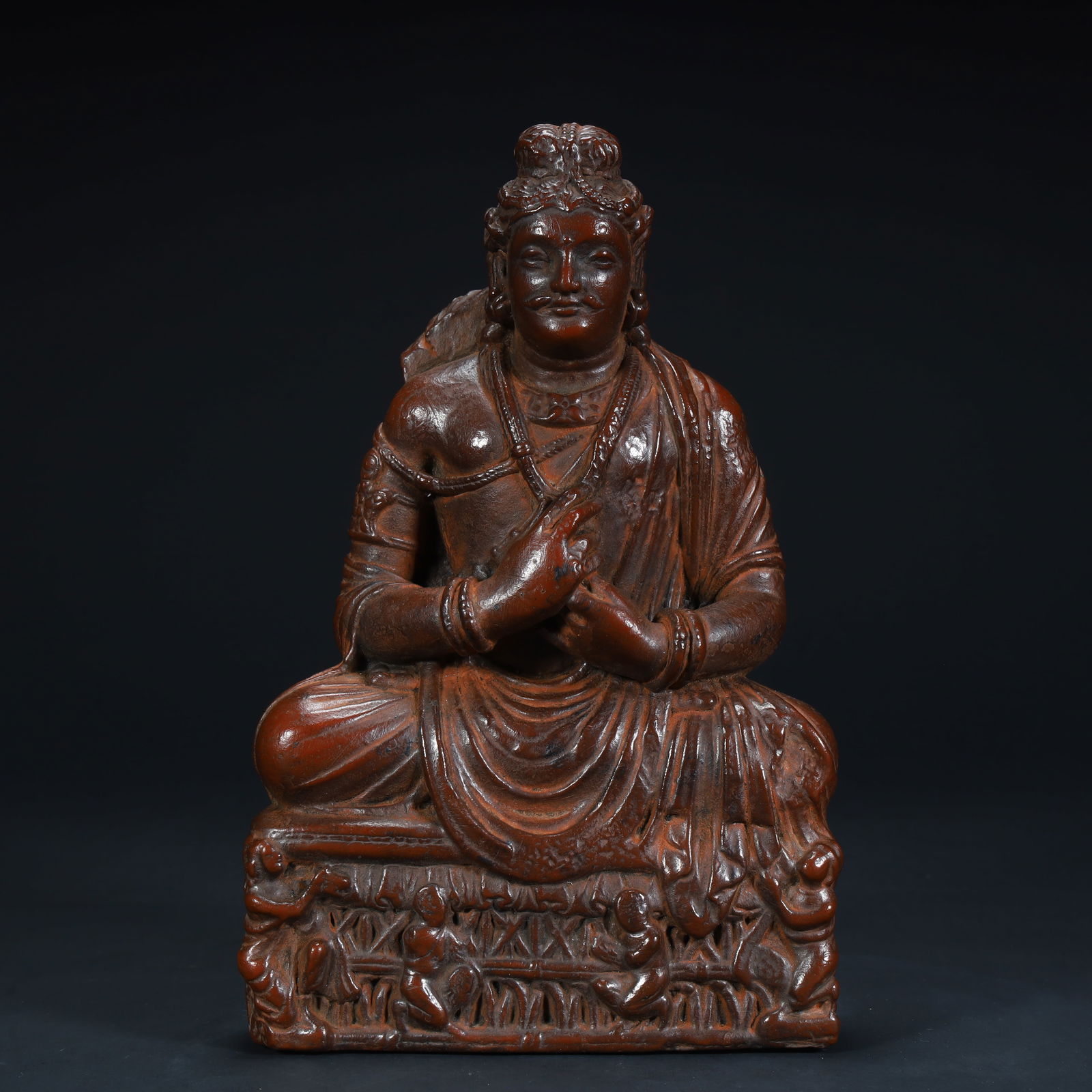 A clay sculpture of the Qing Dynasty "Many Sons and Many Blessings" seated statue of the Bodhisattva (1 of 9)