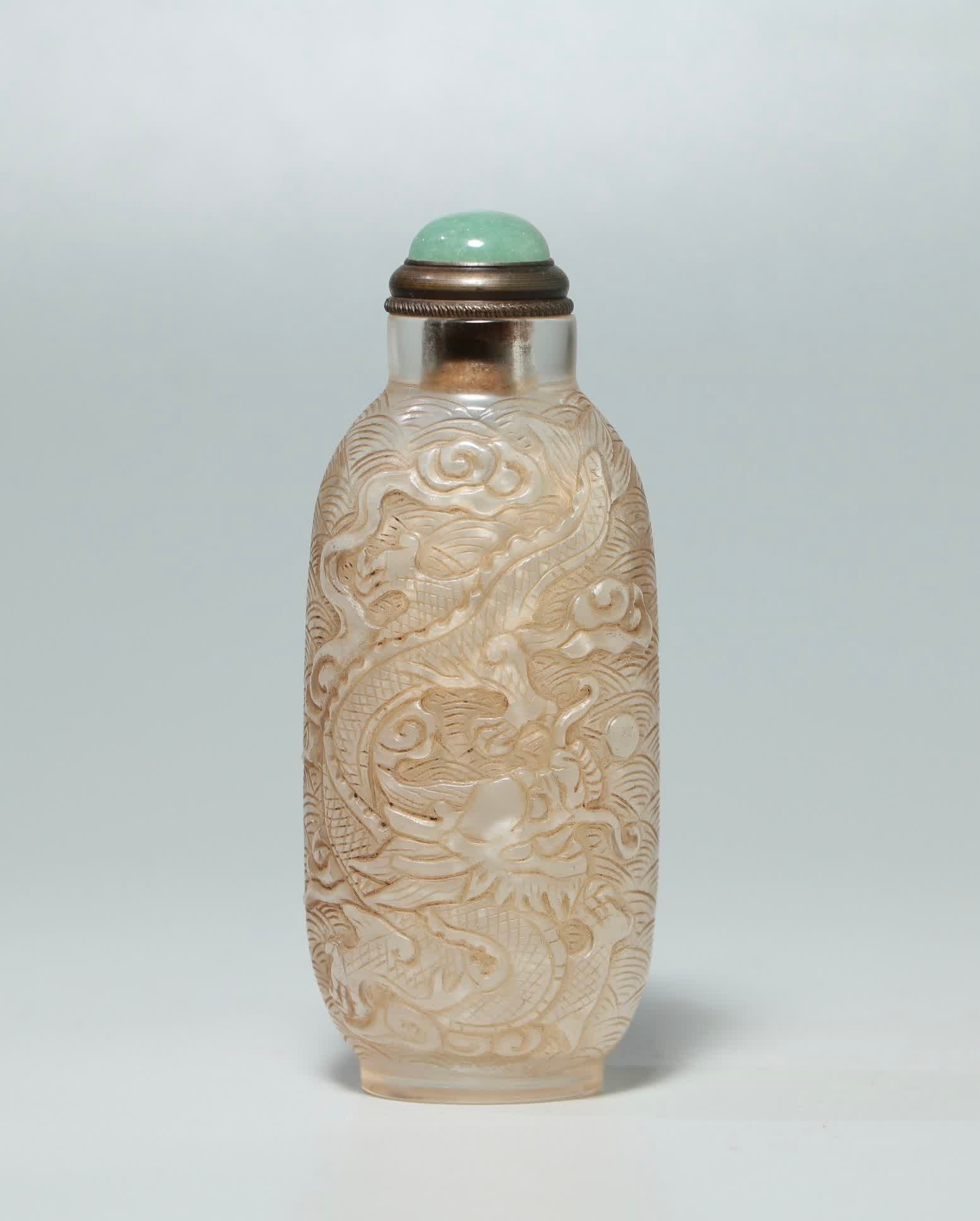 Qing Dynasty crystal seawater dragon pattern snuff bottle (1 of 6)