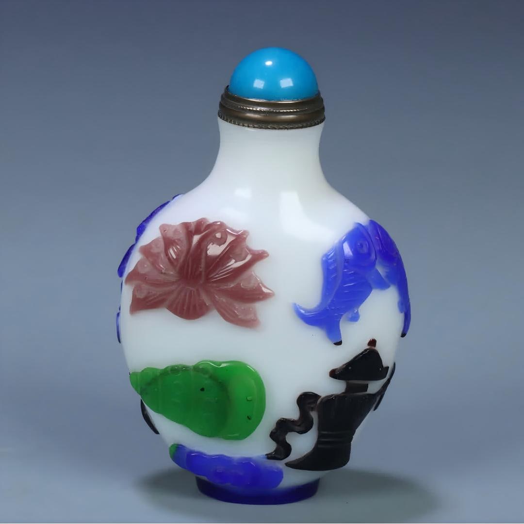 A Tongzhi year material maker set eight treasure pattern snuff bottle (1 of 11)