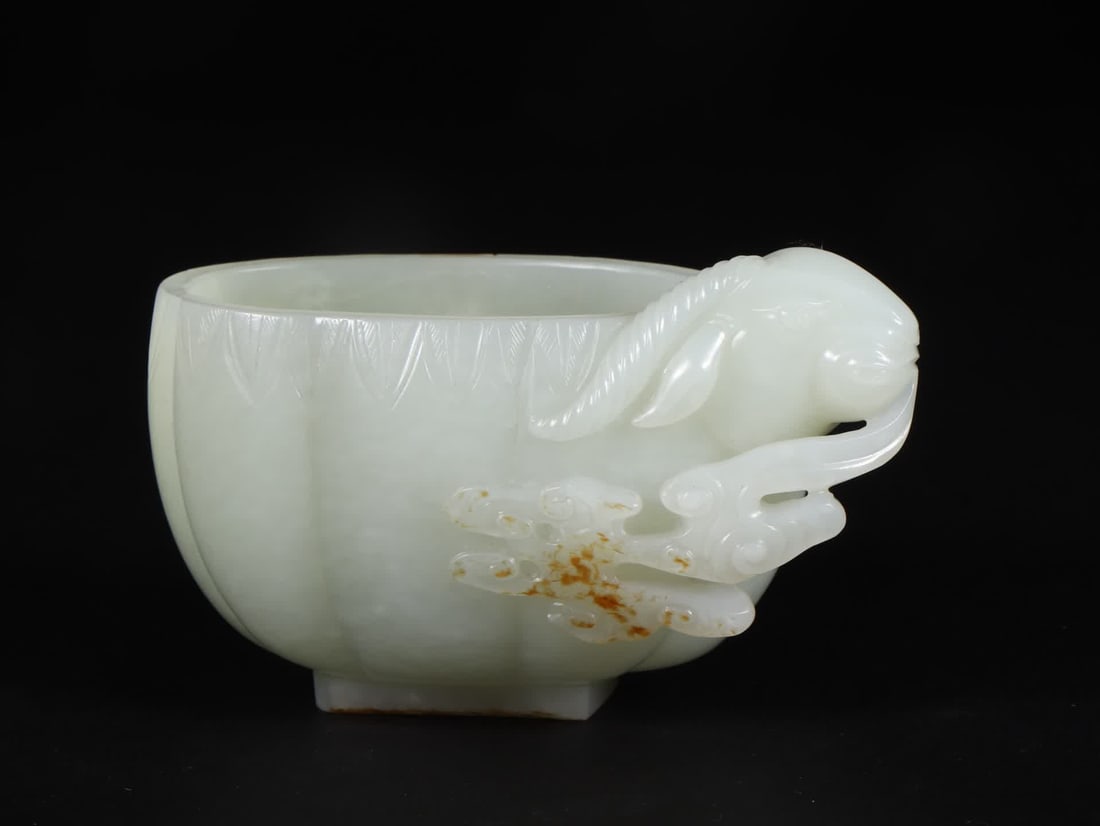 A Qing Dynasty Hetian jade banana leaf pattern sheep's head cup (1 of 9)