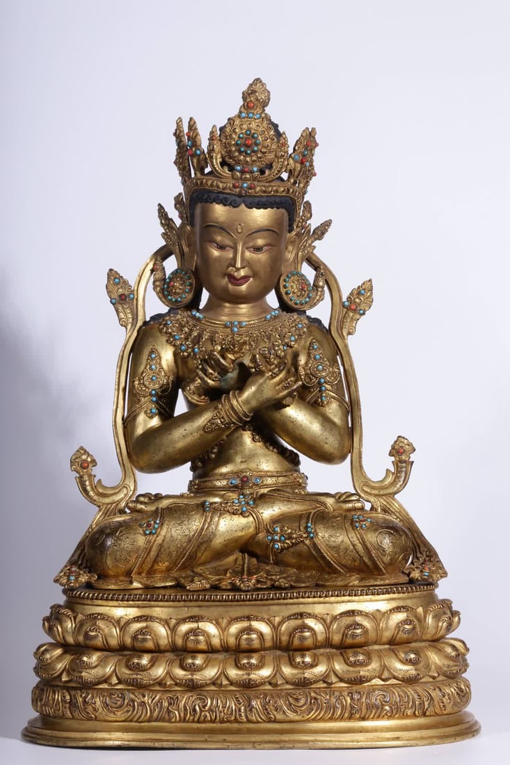 A seated statue of the King Kong in the Qing Dynasty with copper gilt inlaid gemstones (1 of 13)