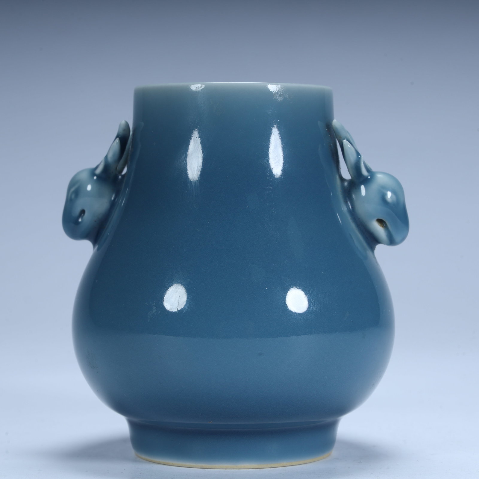 A Qing Dynasty sky blue glaze double sheep ear statue (1 of 11)