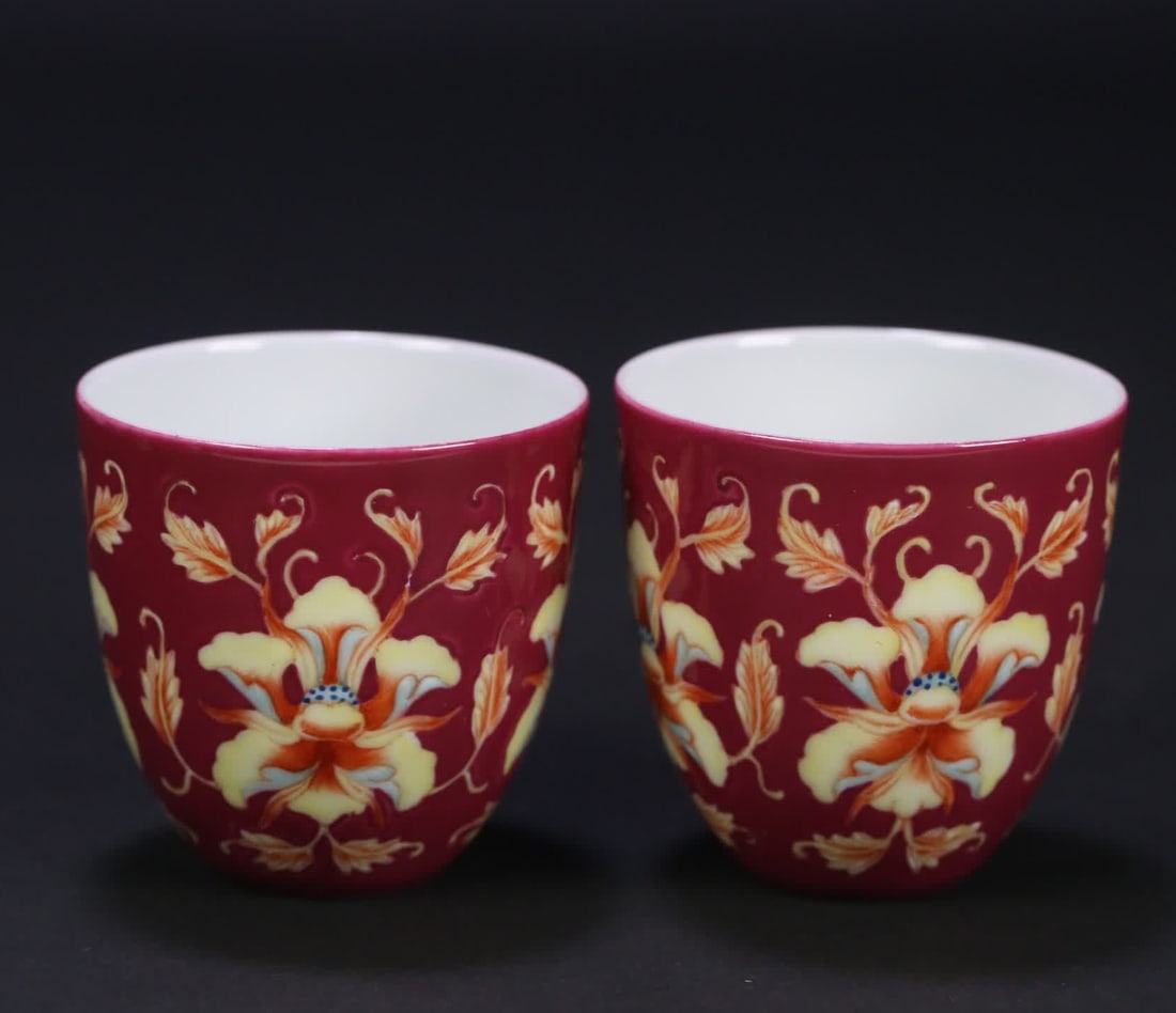A pair of Qing Kangxi year carmine glazed pastel flower cups (1 of 9)
