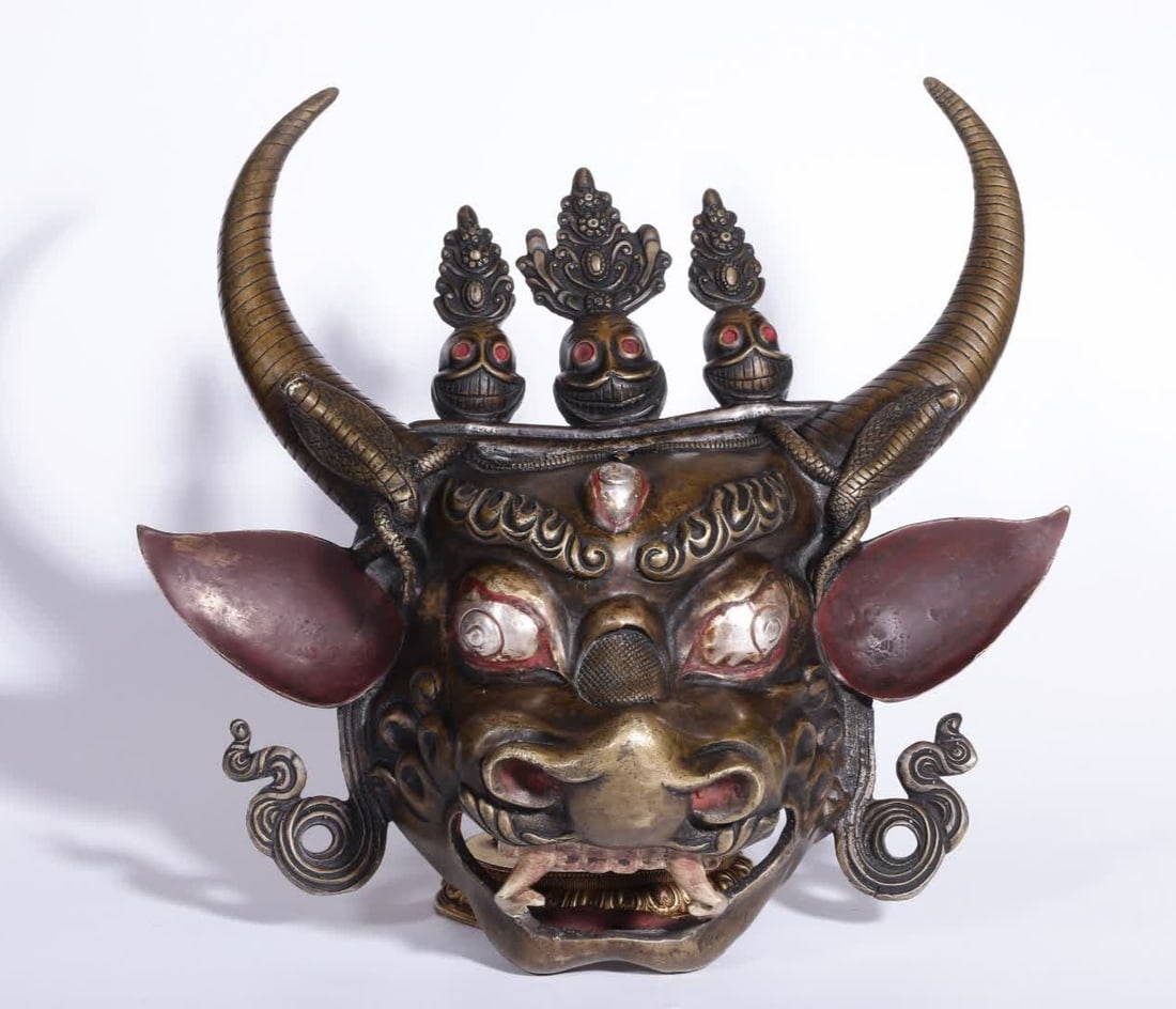 A Qing Dynasty alloy copper silver bull head diamond mask (1 of 9)
