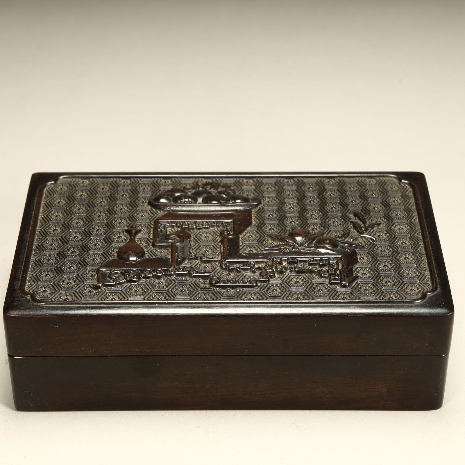 A Qing Dynasty mahogany carved Bogu pattern lid box (1 of 7)