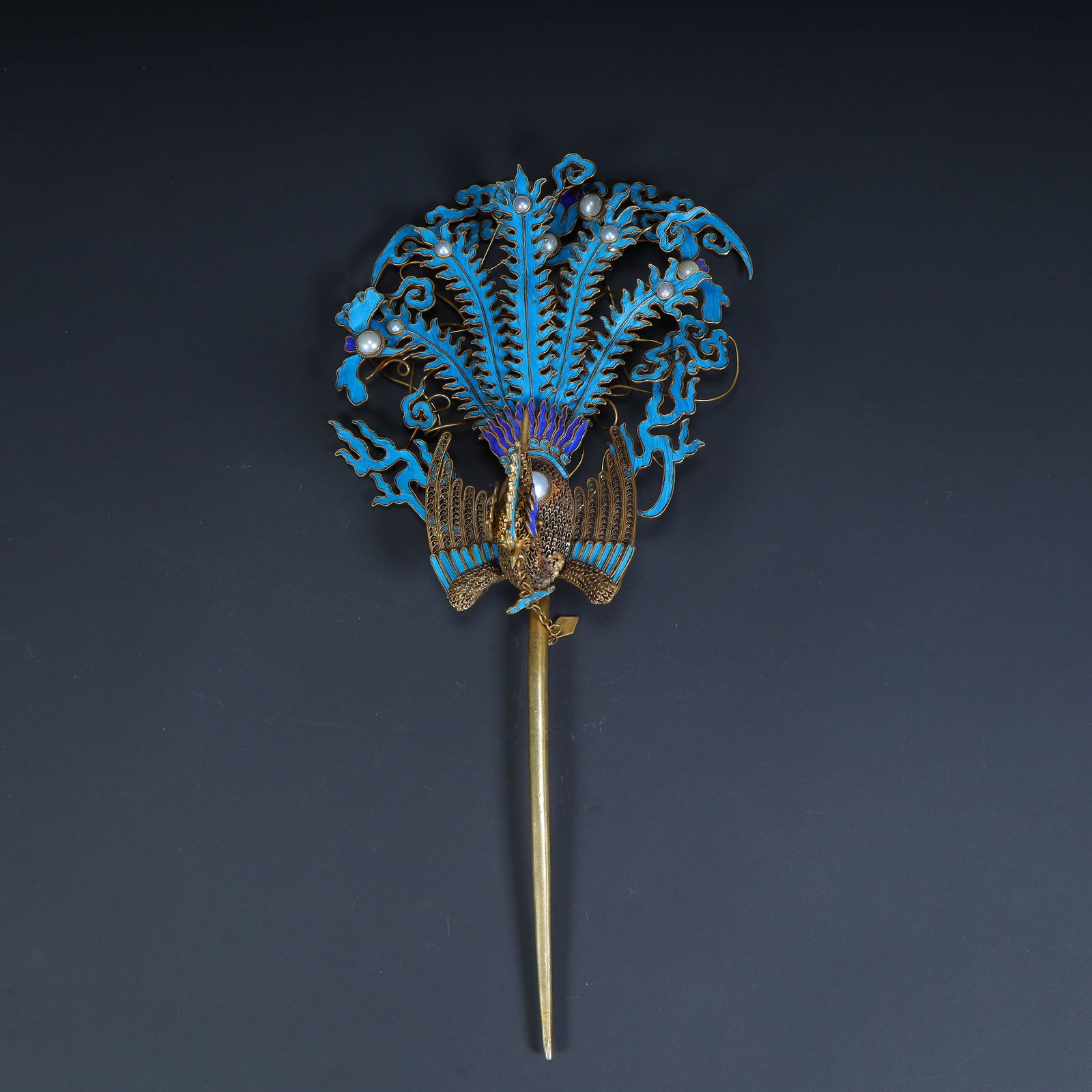 A Qing Dynasty burnt blue inlaid bead phoenix pattern hairpin (1 of 11)
