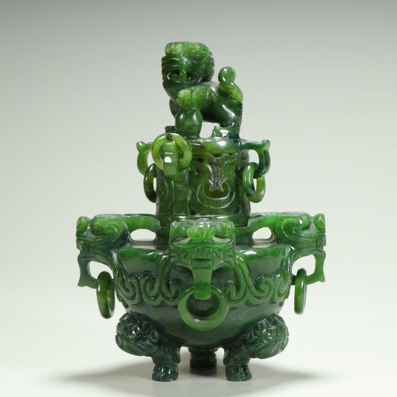 A three-legged aromatherapy burner in the Qing Dynasty Hetian jasper lion button dragon earring ring: Qing Dynasty Hetian jasper lion button dragon earring three-legged aromatherapy stove SIZE: H:14cm L:10.3cm W:10.3cm W:494g (The Dimensions Of All Batches Are Manually Measured.If You Need More Detail