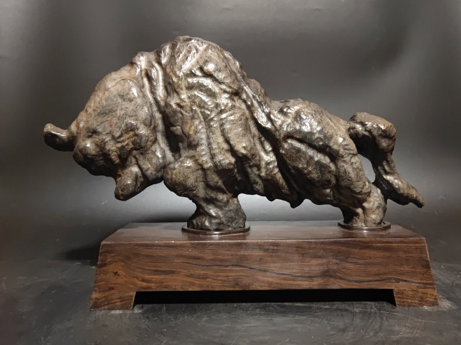 A Qing Dynasty Lingbi stone "Bullish" ornament (1 of 8)