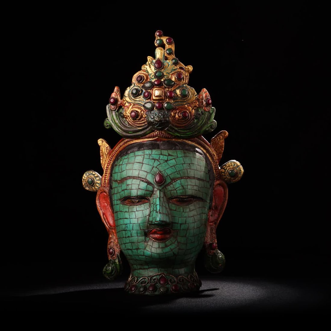 A Nepalese monastery inlaid with gemstones painted with gold painted Tibetan Buddhist craft green (1 of 9)