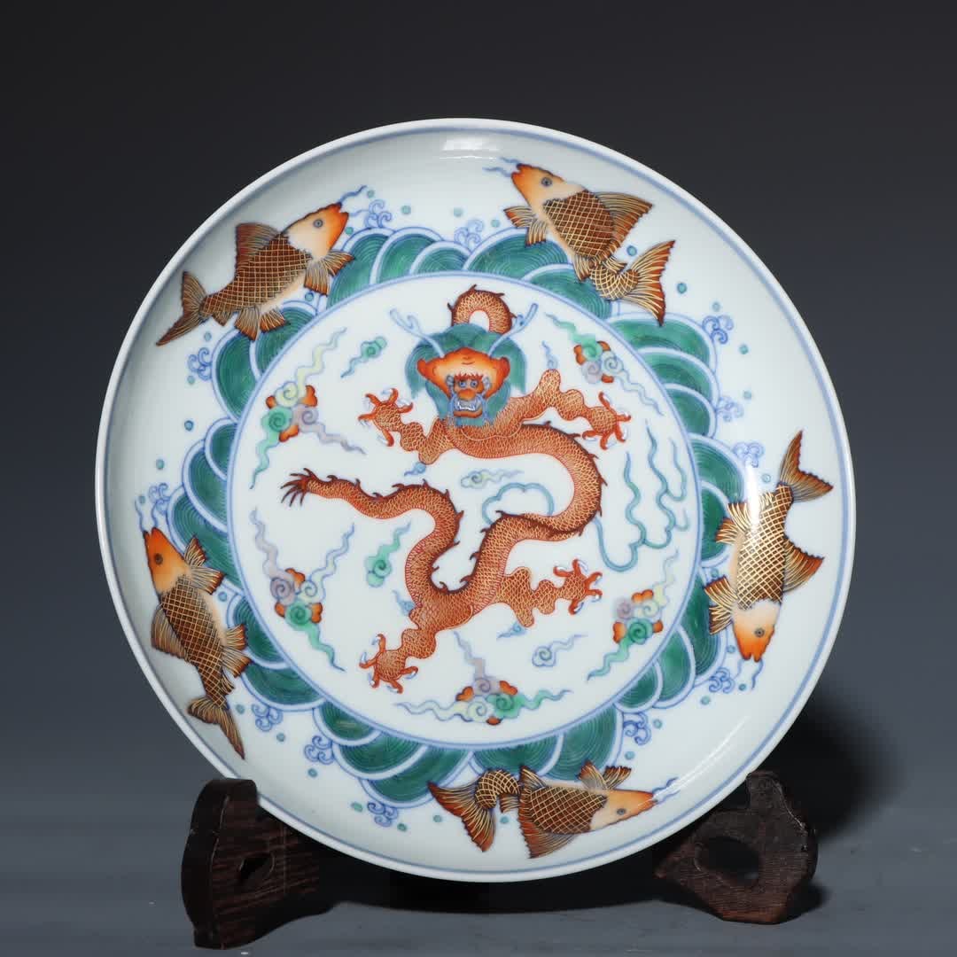 A Qing Yongzheng Doucai gold-painted fish dragon plate (1 of 9)