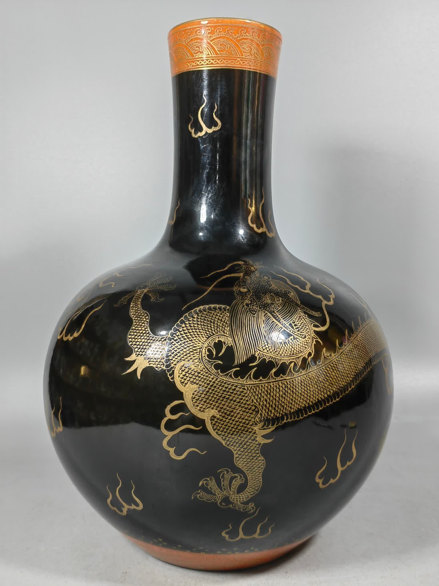A Qing Dynasty gold-painted dragon sky ball bottle with a black background: Qing Dynasty black background gold-painted dragon sky ball bottle SIZE: H:31.5cm W:23cm (The Dimensions Of All Batches Are Manually Measured.If You Need More Detailed Information, Please Contact Our C