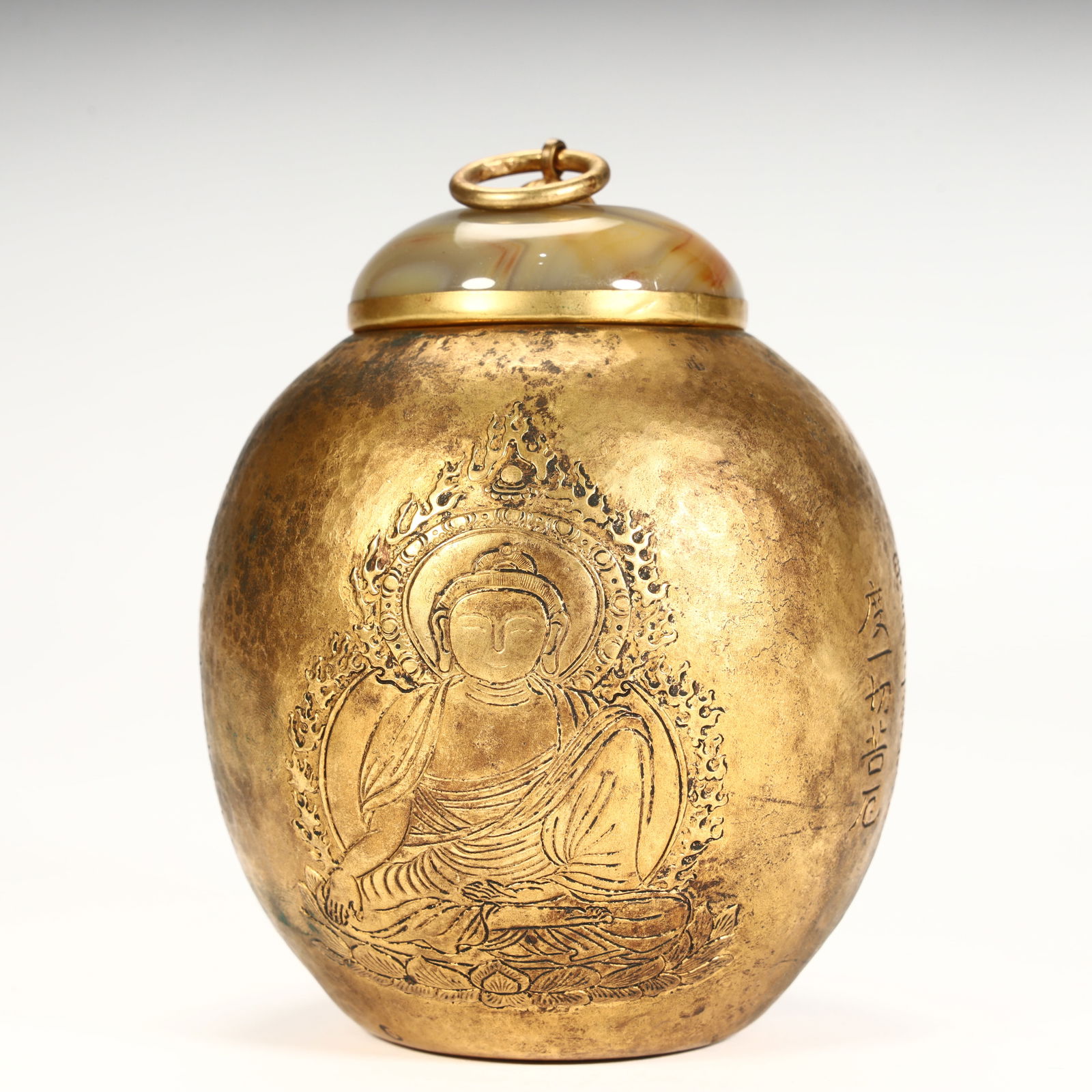A Tang Dynasty copper gilt Buddha statue pattern agate lid jar (1 of 8)