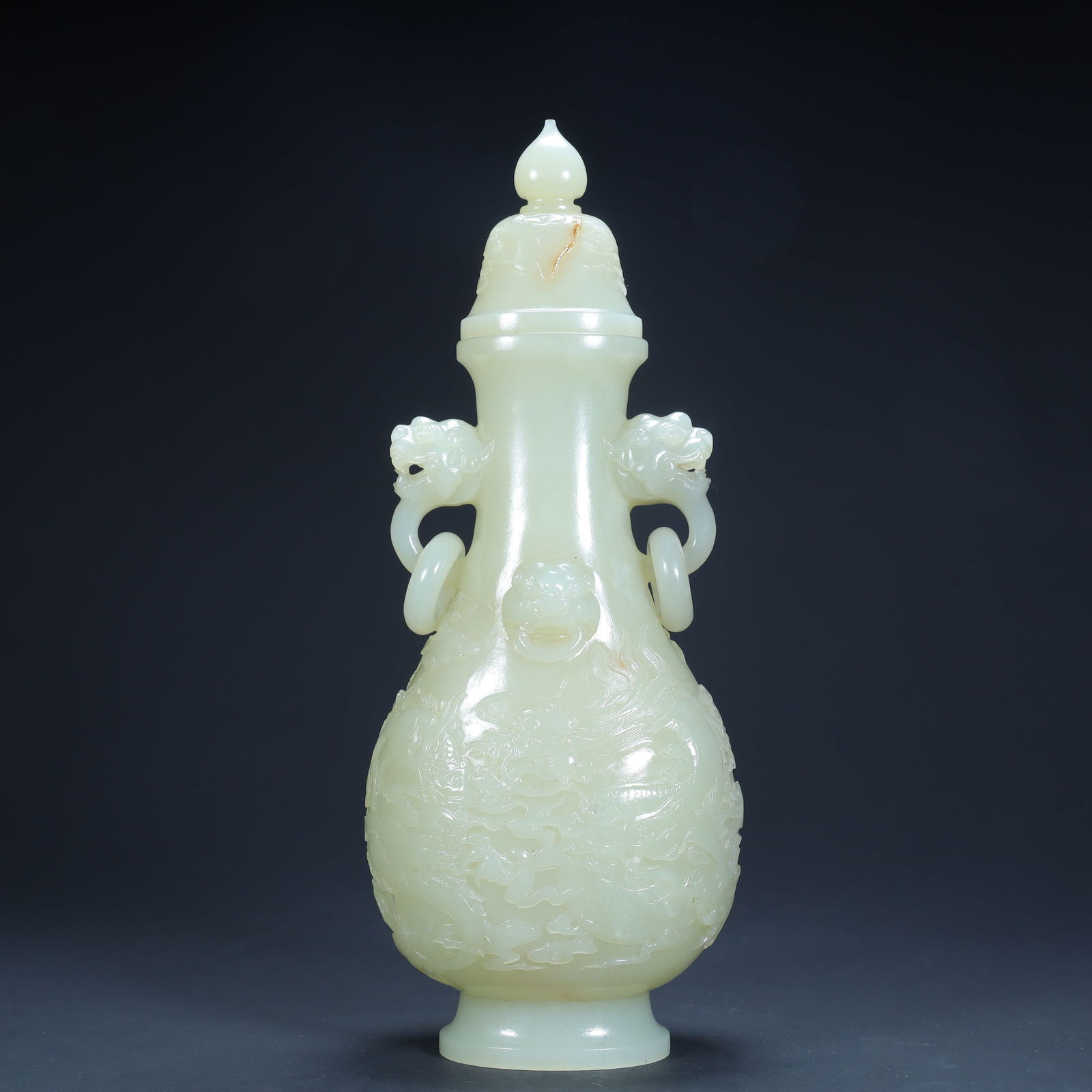 A Qing Dynasty Hetian jade dragon pattern live ring ear bottle (1 of 13)