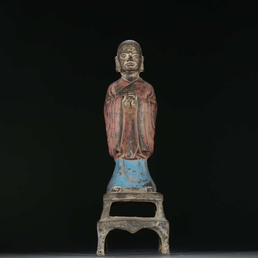 A bronze painted statue of Ananda (1 of 9)