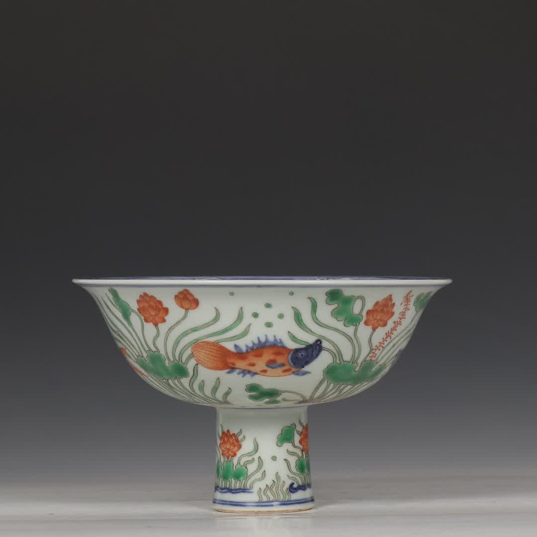 A Ming Xuande blue and white colorful fish algae lotus pond pattern goblet: Ming Xuande blue and white colorful fish algae lotus pond pattern goblet SIZE: H:11.5cm mouthD:18.6cm (The Dimensions Of All Batches Are Manually Measured.If You Need More Detailed Information, Please