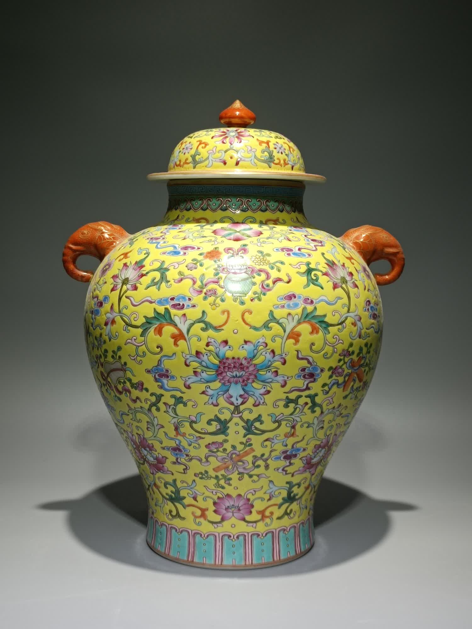 A pastel yellow lotus support eight treasures elephant ear general jar made in the Qianlong period (1 of 9)