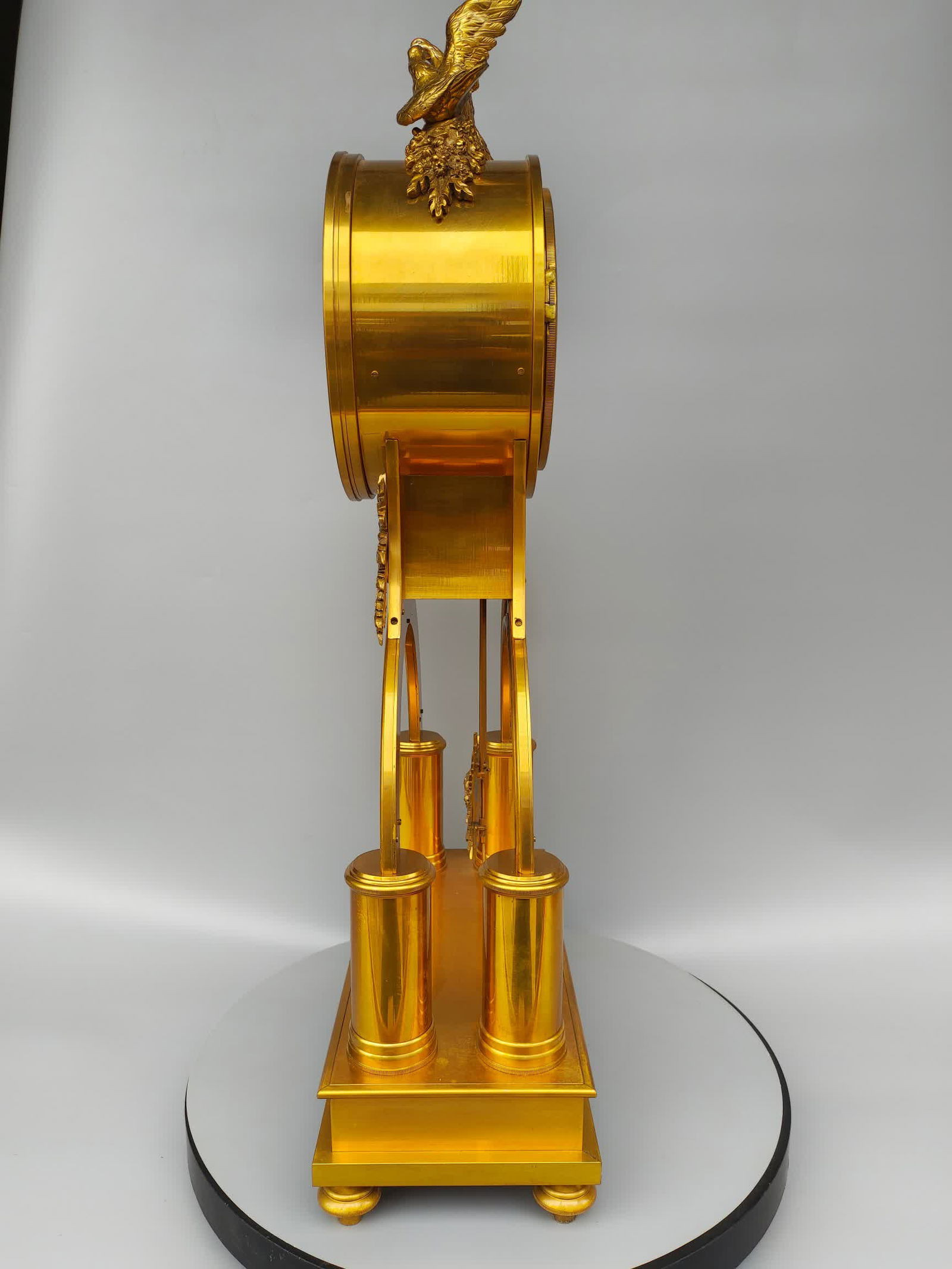 A gilt cast copper mechanical table clock - 7