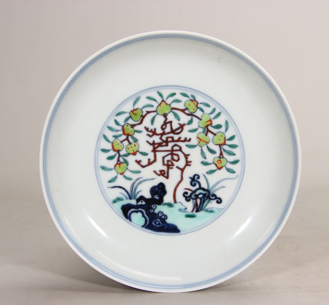 A Qing Dynasty Yongzheng Doucai entwined branch longevity pattern plate (1 of 9)