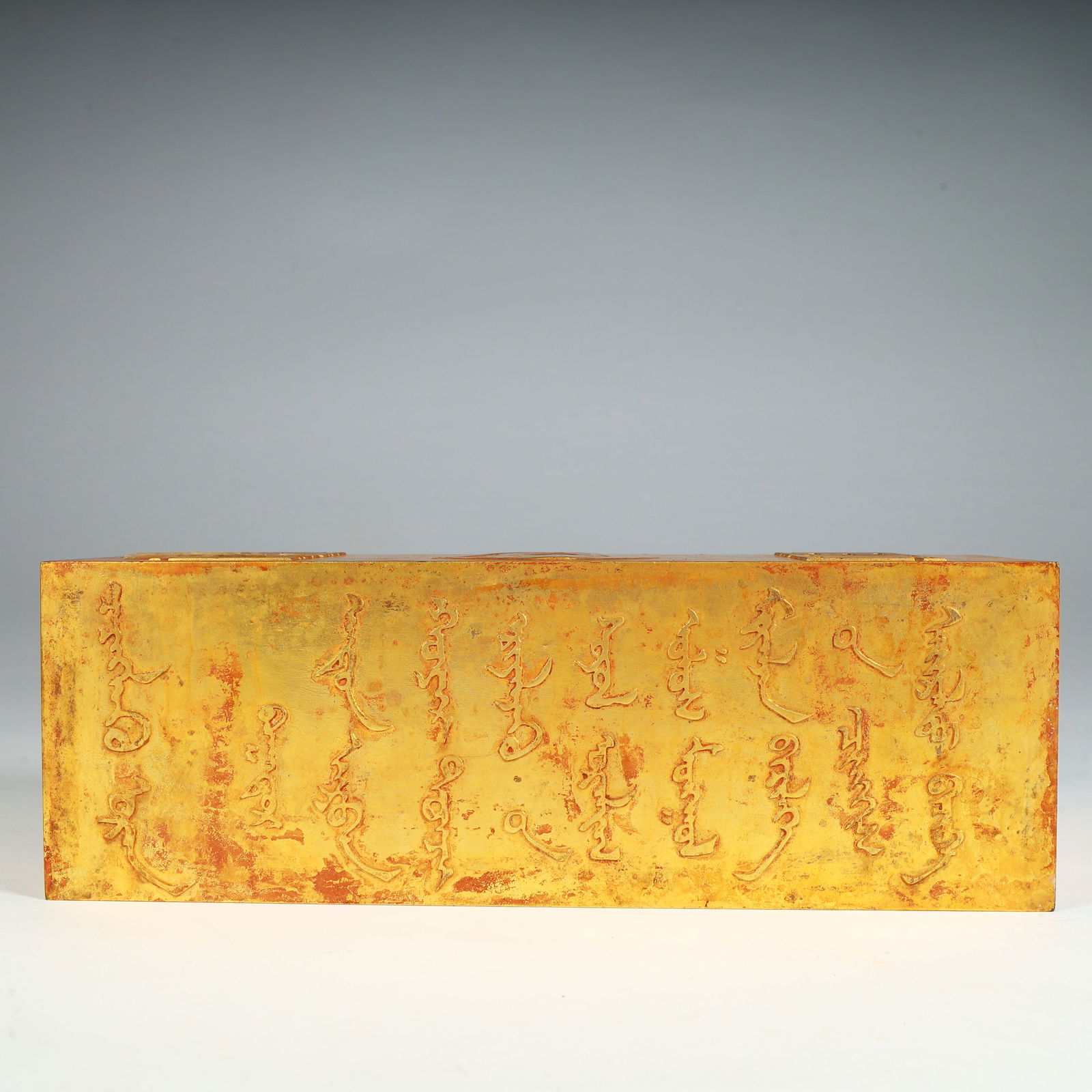 A silver-gilt block - 5