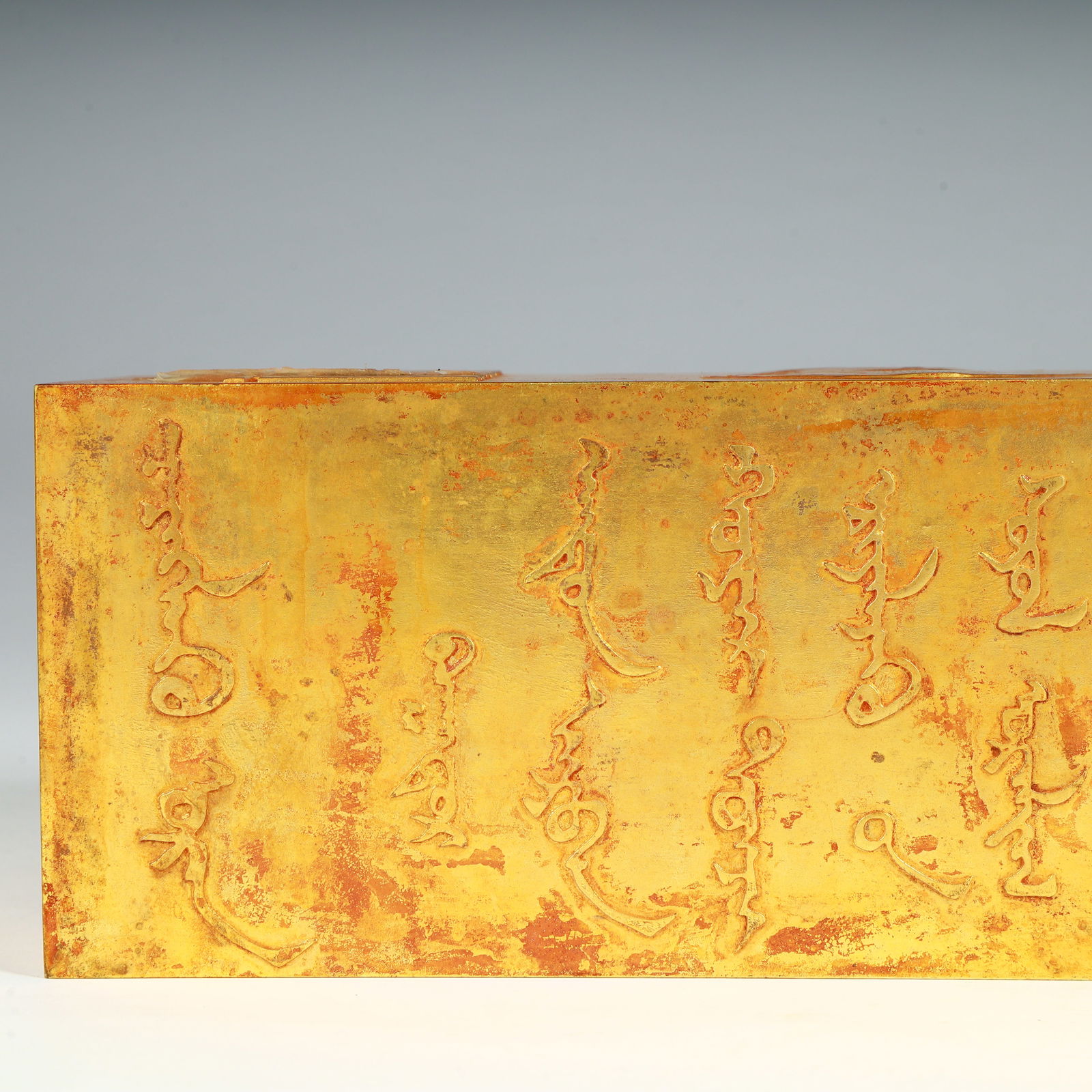 A silver-gilt block - 6