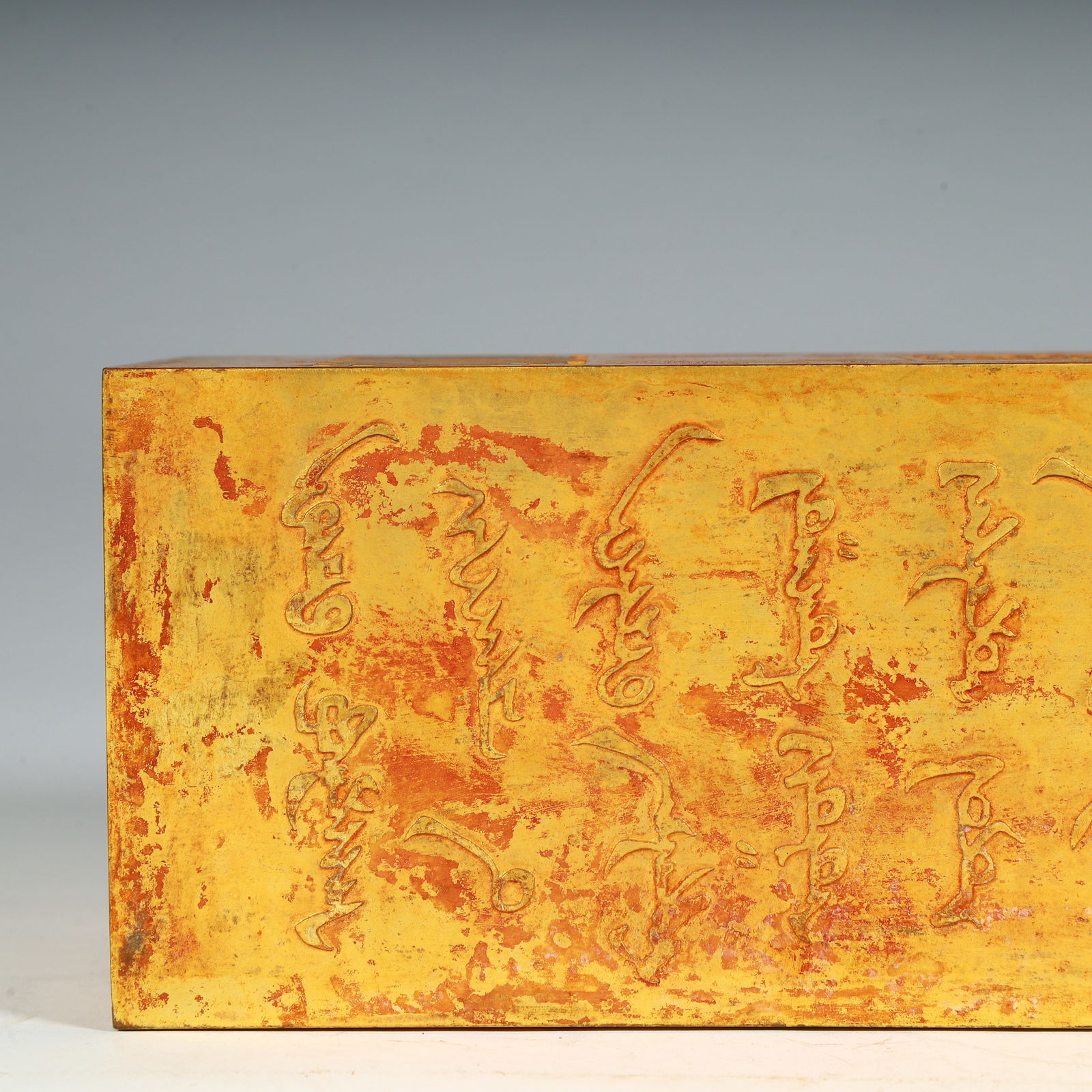 A silver-gilt block - 8