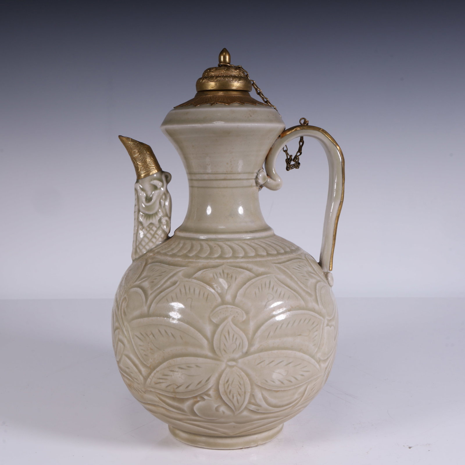 A celadon carved gilt pot (1 of 10)