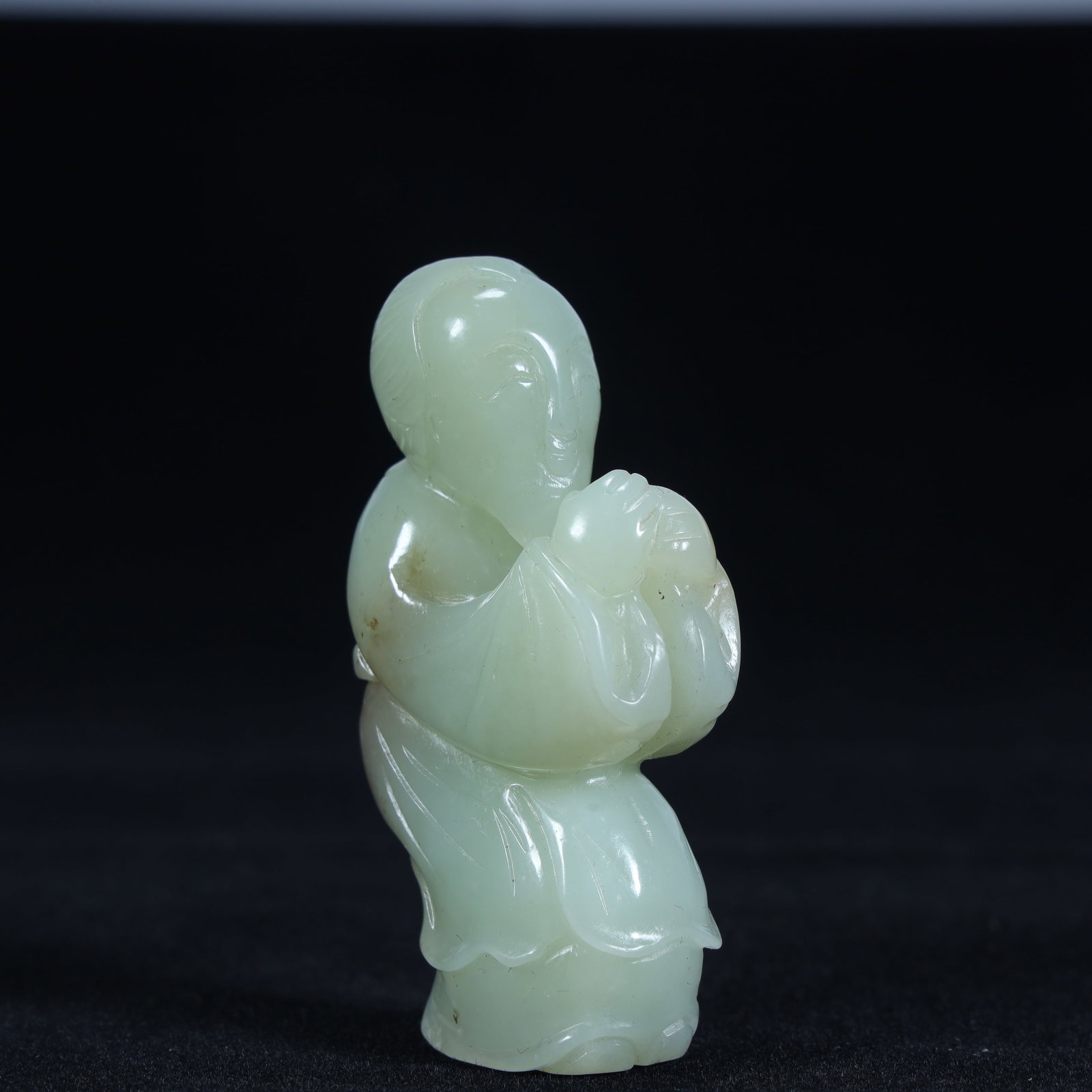 A piece of Hetian jade holding peach boy in the Qing Dynasty (1 of 9)