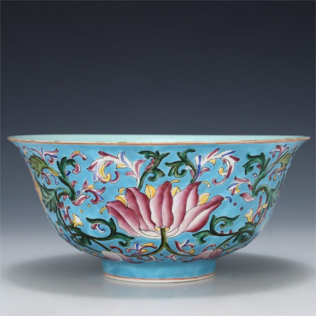 A sky blue glazed enamel flower bowl made in the Qianlong period of the Qing Dynasty: Qing Dynasty Qianlong year sky blue glazed enamel flower bowl Size:H:9.7cm Calibre:20.3cm (The Dimensions Of All Batches Are Manually Measured.If You Need More Detailed Information, Please Contact Our
